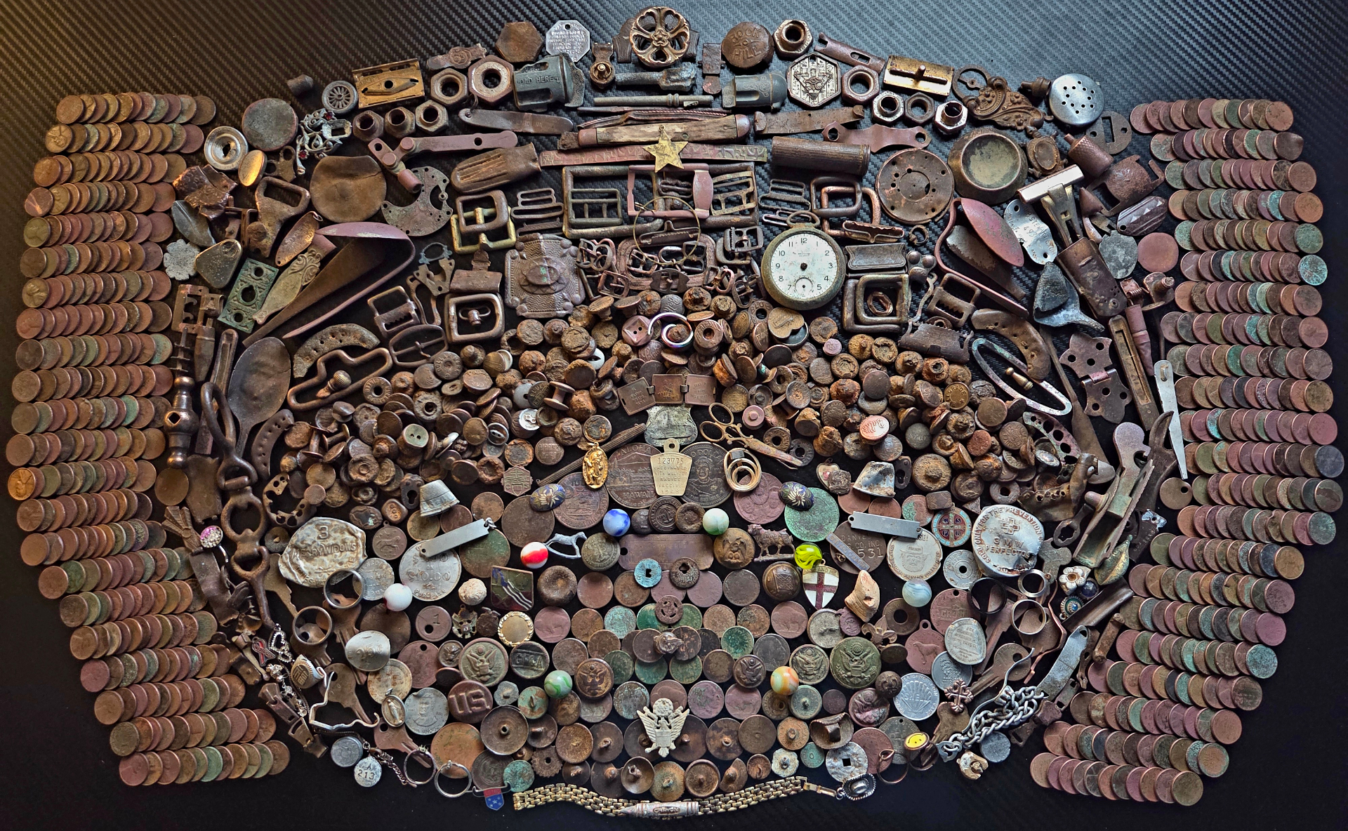 All the coins, relics, buttons, buckles and jewelry recovered in 2025